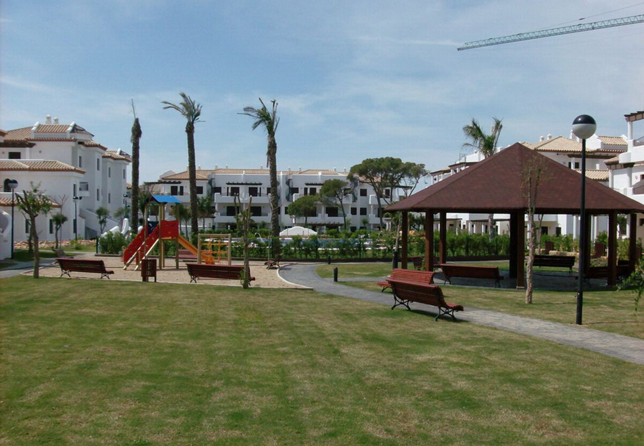 Ferienwohnung in Chiclana de la Frontera - Apartamento bajo con jardín - R153 Residencial CSP