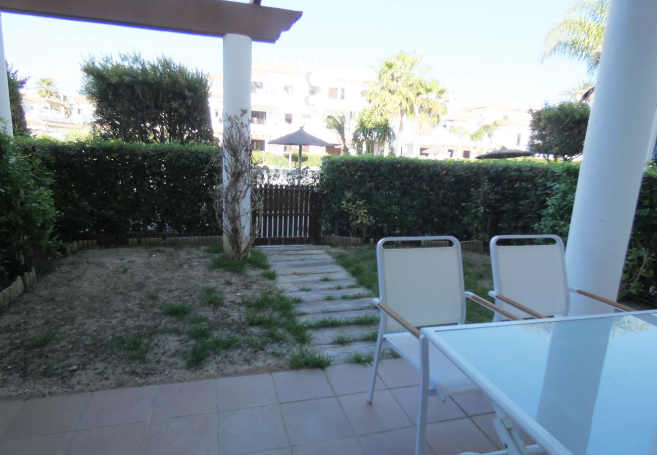 Ferienwohnung in Chiclana de la Frontera - Bajo con jardín - R040 Coto Sancti Petri 