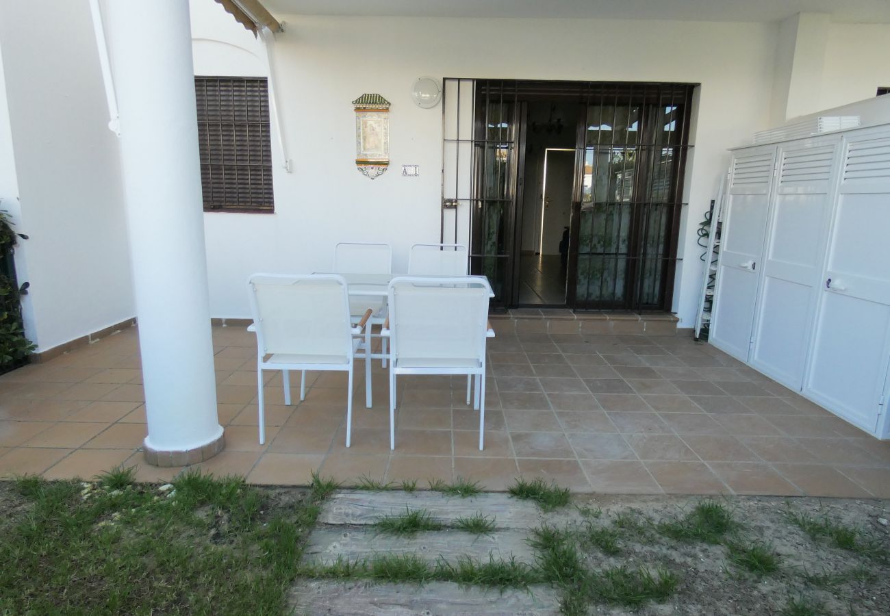 Ferienwohnung in Chiclana de la Frontera - Bajo con jardín - R040 Coto Sancti Petri 