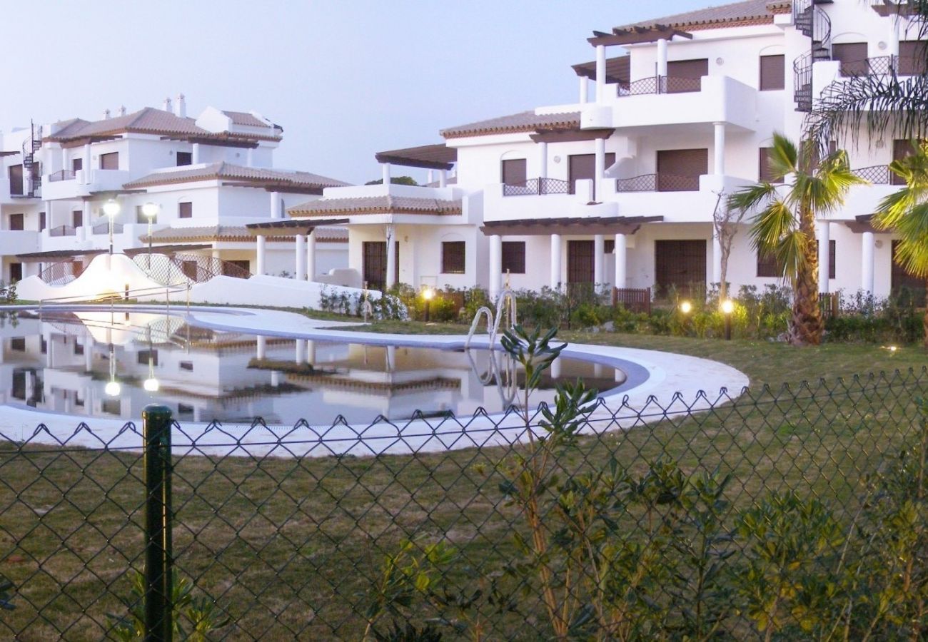 Ferienwohnung in Chiclana de la Frontera - Bajo con jardín - R040 Coto Sancti Petri 